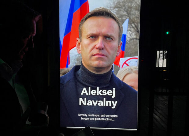 Jailed Russian opposition leader Alexei Navalny is seen in a photograph at Loevestein Castle where a replica of his prison cell is on display as part of the exhibit "Silenced", the Netherlands, March 30, 2023. REUTERS/Anthony Deutsch/File Photo