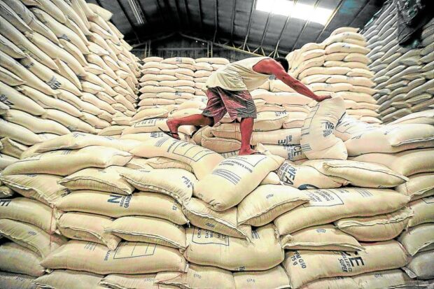 PHOTO: Sacks of rice are stockpiled at the National Food Authority warehouse in Quezon City in this photo taken in 2020. STORY: Senate eyes probe into anomalous sale of NFA rice at low prices